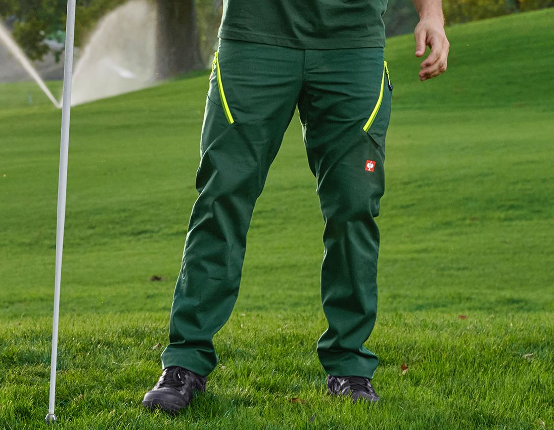 Pracovní kalhoty: Kalhoty s více kapsami e.s.ambition + zelená/výstražná žlutá 1