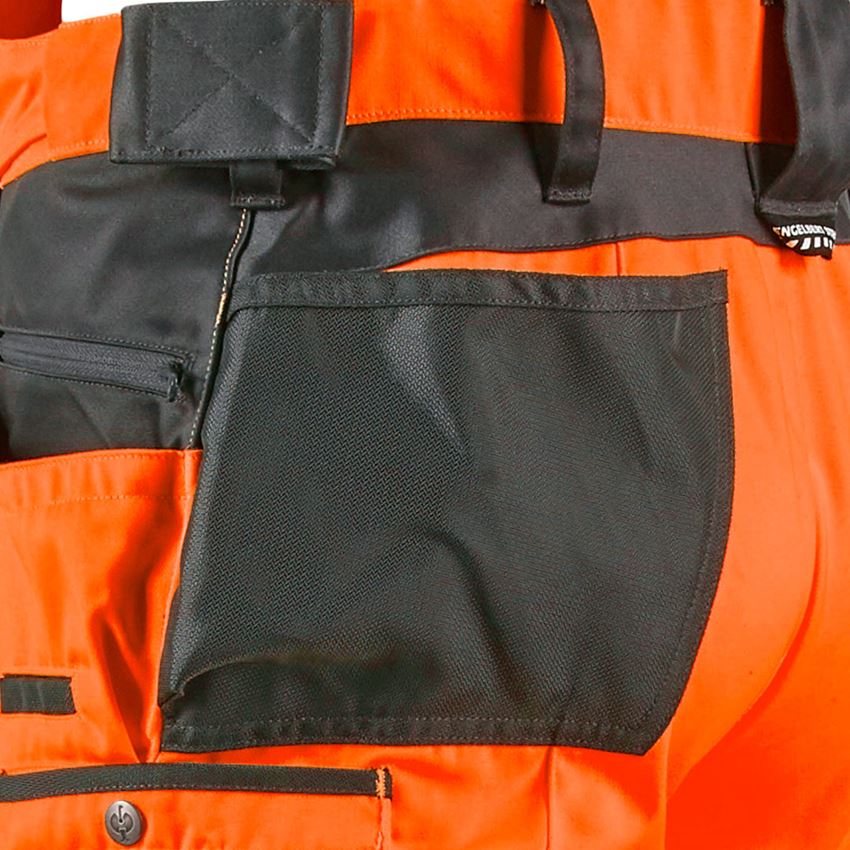 Pracovní kalhoty: Kalhoty s laclem a výstražnými prvky e.s.motion + výstražná oranžová/antracit 2