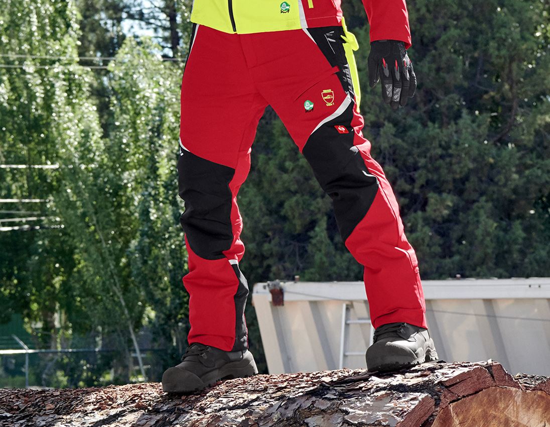 Pracovní kalhoty: e.s. Lesnické protipořezové kalhoty do pasu, KWF + červená/výstražná žlutá