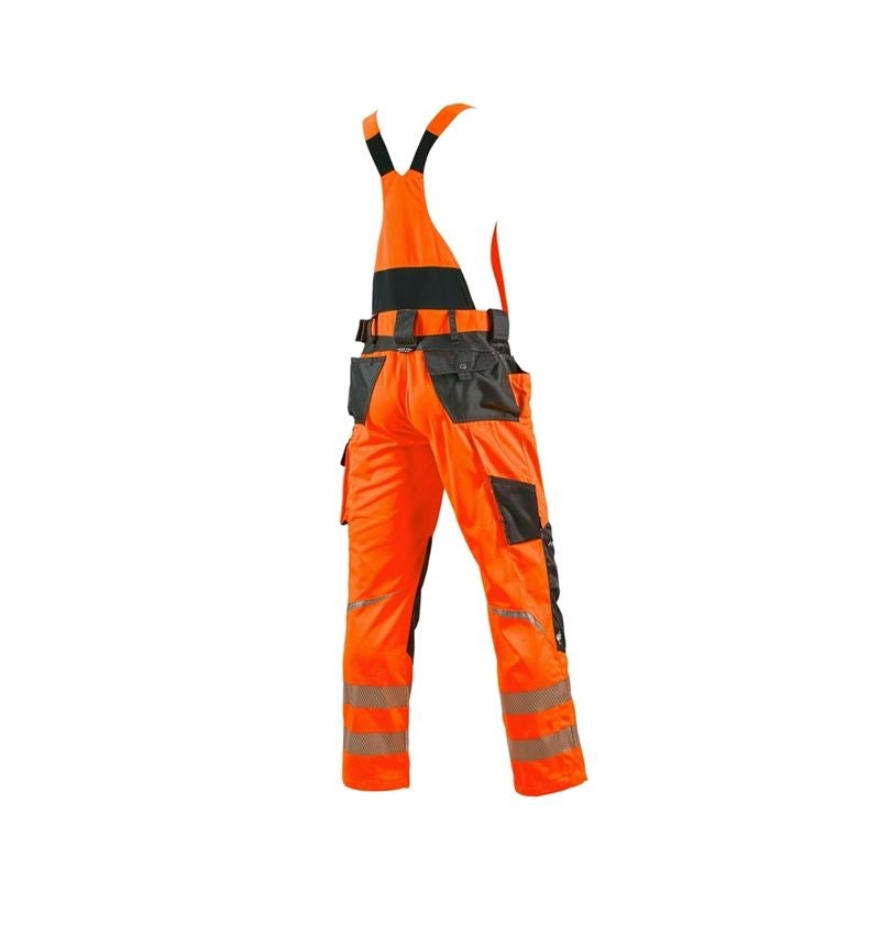 Pracovní kalhoty: Kalhoty s laclem a výstražnými prvky e.s.motion + výstražná oranžová/antracit 1